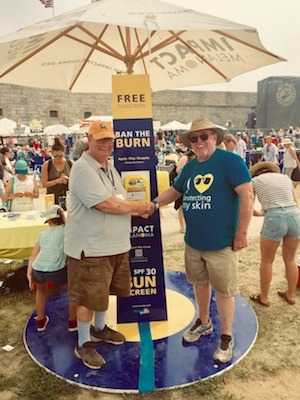 Tom (on the right) set up at the 2018 Newport Folk Festival