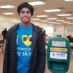 Nilan Nandish places sunscreen dispensers in Detroit